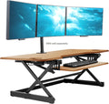 Rocelco 46" Large Height Adjustable Standing Desk Converter - Quick Sit Stand Up Triple Monitor Riser - Gas Spring Computer Workstation - Retractable Keyboard Tray - Teak Wood Grain (R DADRT-46)